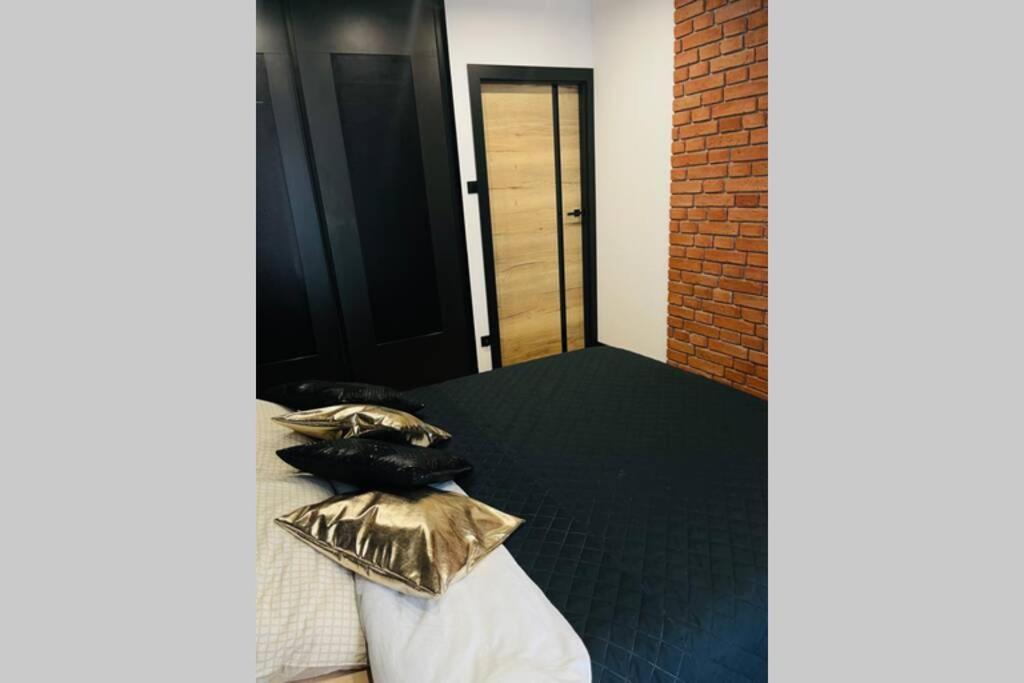 Appartamento Apartament Manufaktura Z Bezplatnym Parkingiem Łódź Esterno foto